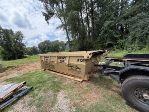 One Stop tan rental dumpster