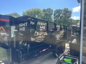 one stop dumpster on truck